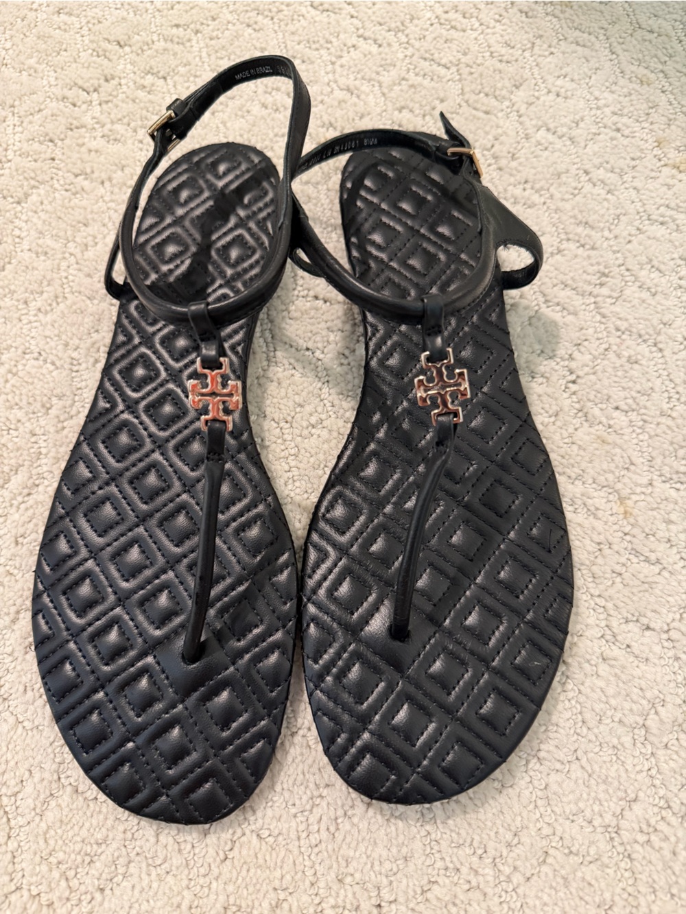 Tory Burch Black Quilted T-Strap Sandals with Gold Logo Accent